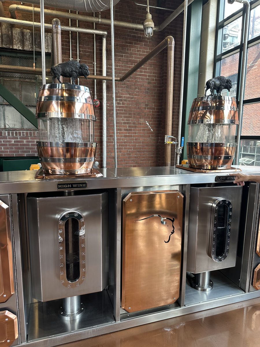 Buffalo Trace copper High Wine and Low Wine stills with buffalo figurines