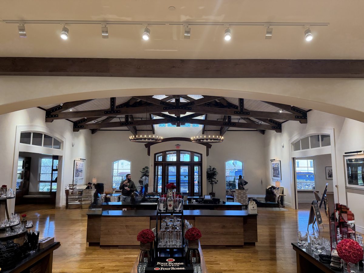 Four Roses visitor center interior with vaulted ceiling and timber trusses
