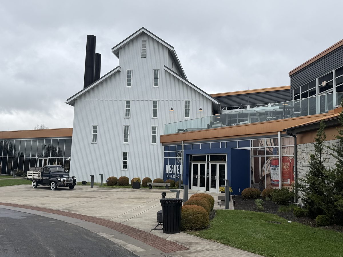 Heaven Hill Bourbon Experience exterior with vintage truck and visitor center