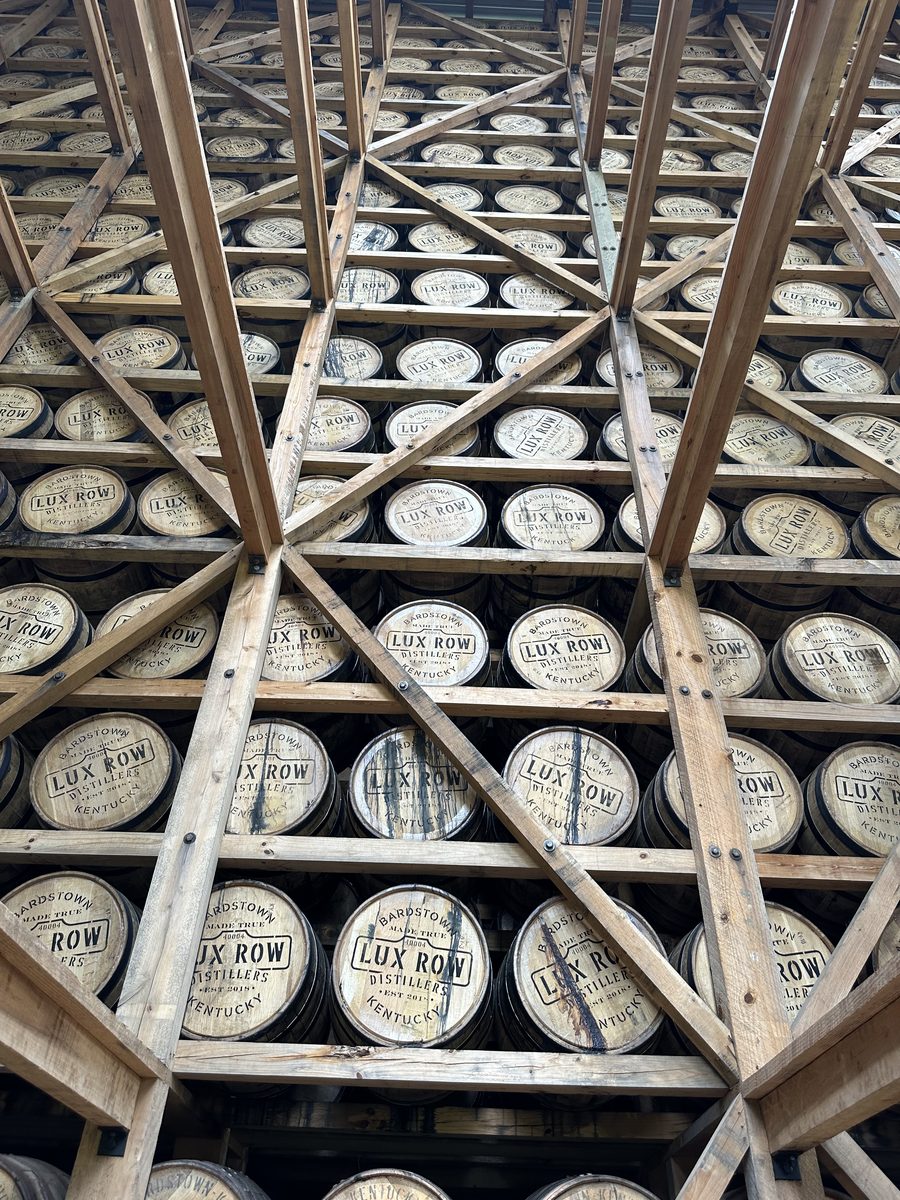 Lux Row rick house with branded barrels stacked floor to ceiling