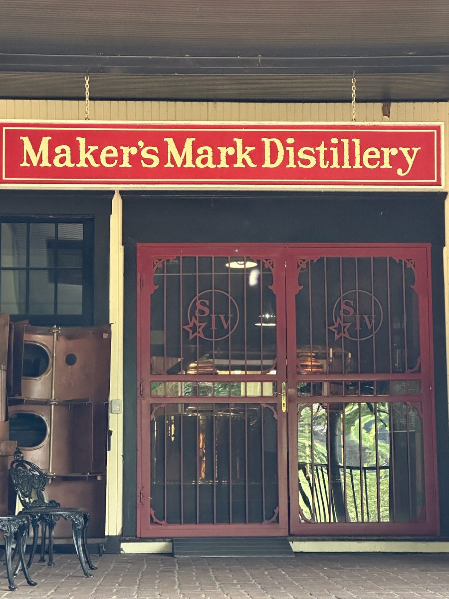 Maker's Mark Distillery red sign and iron-gated entrance doors