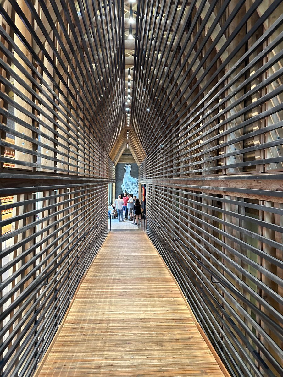 Wild Turkey slatted wood and metal hallway with vanishing perspective